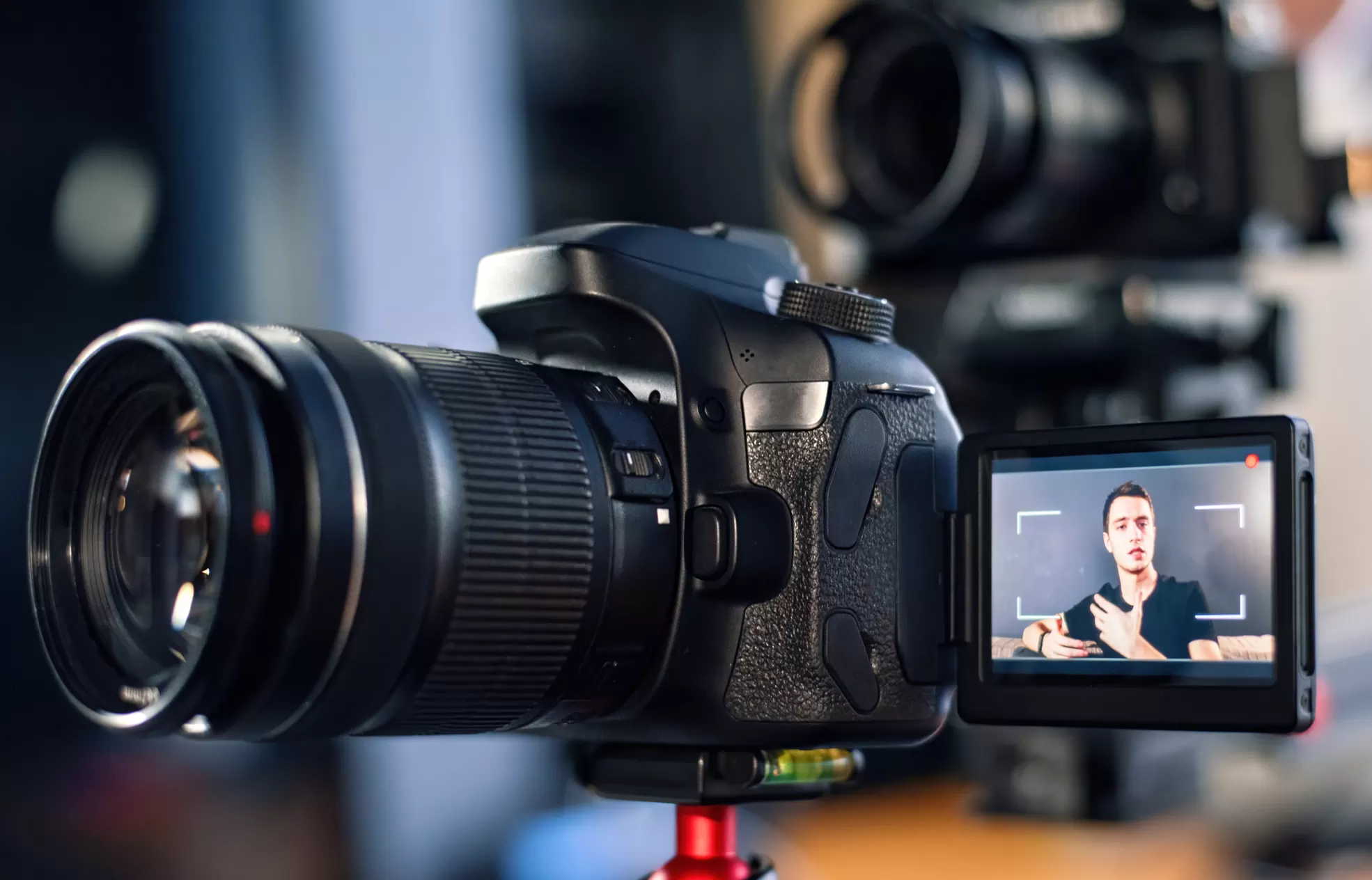 camera filming someone talking