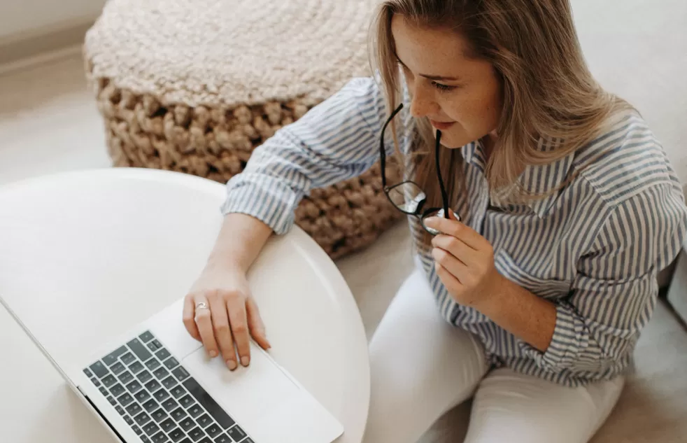 person using laptop smiling